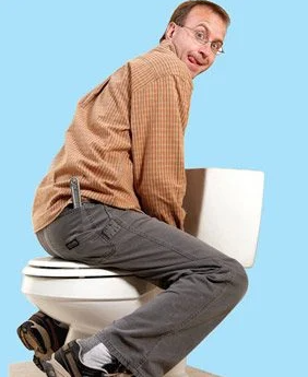 Sitting On a Toilet Backwards Knees Angled At 45 Degrees